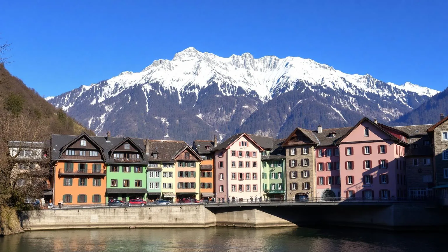 Kleurrijke huizen in Innsbruck met de Nordkette op de achtergrond